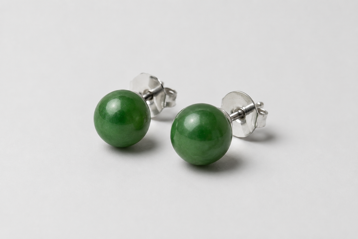 Giada Canadian jade stud earrings on a light gray background