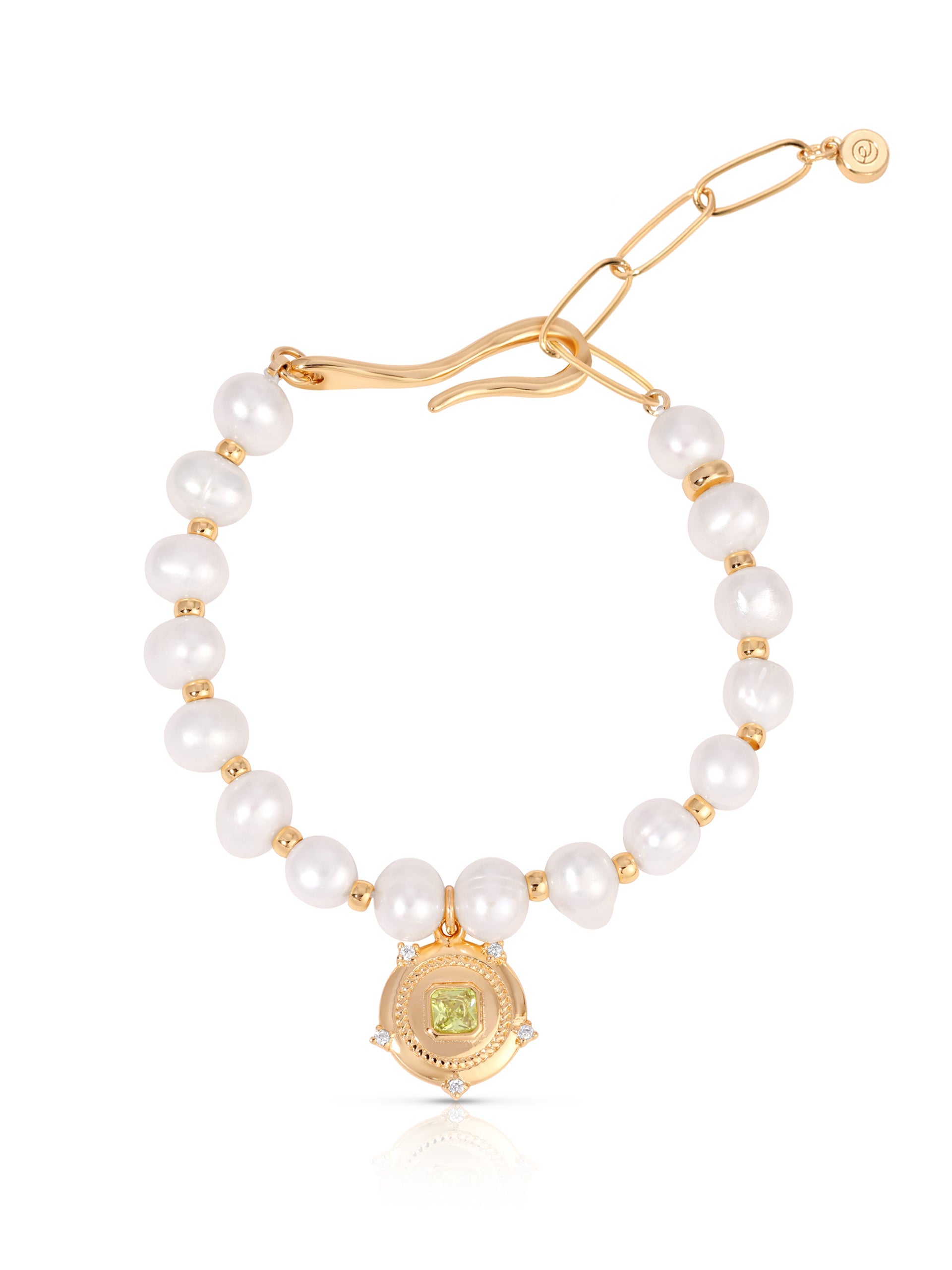 Penelope freshwater pearl bracelet with gold hook closure and pale green cubic zirconia charm on white background. 