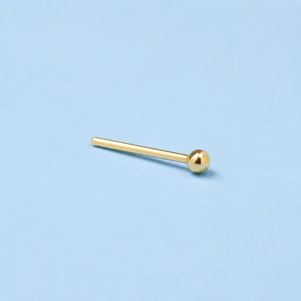 The Hayes Stud
Solid 14K Gold Nose Stud