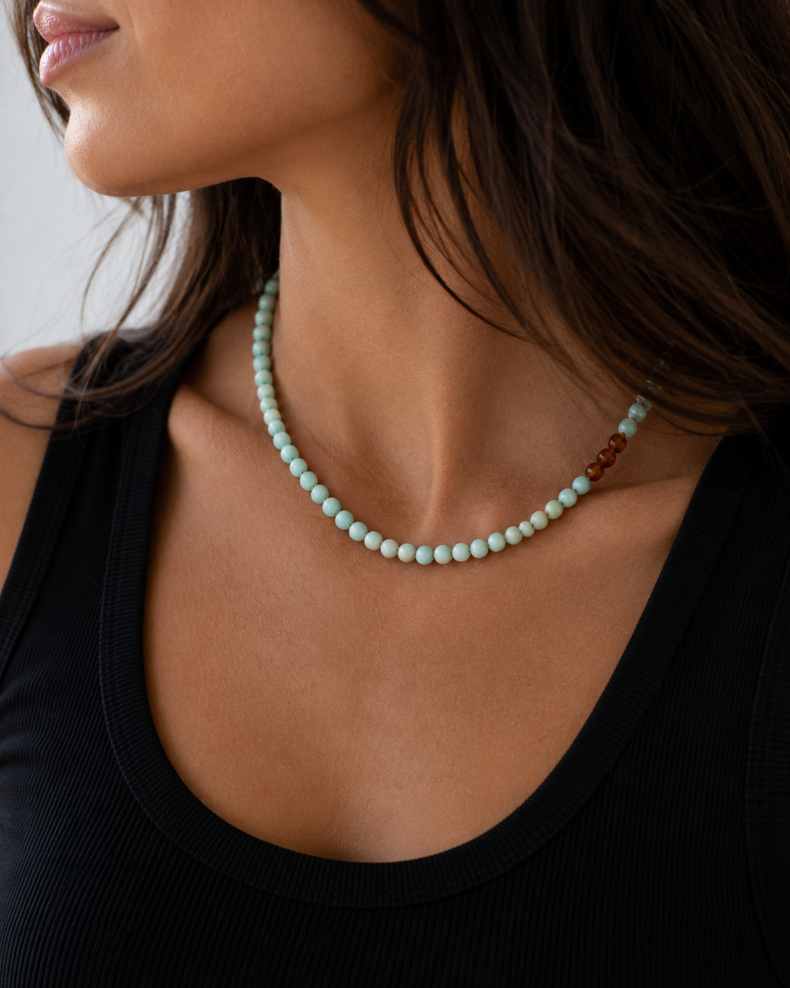 A realistic close-up showing how Maren looks worn alone with a black top.