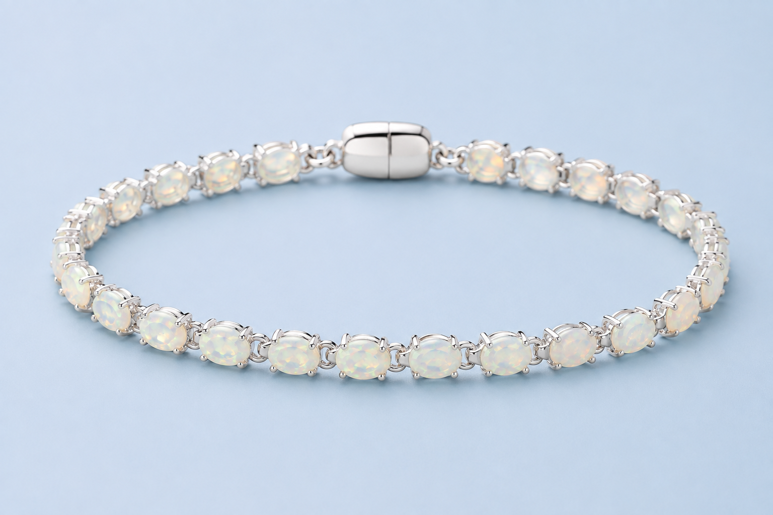 Ophelia natural Ethiopian opal tennis bracelet in .925 sterling silver on pale blue background