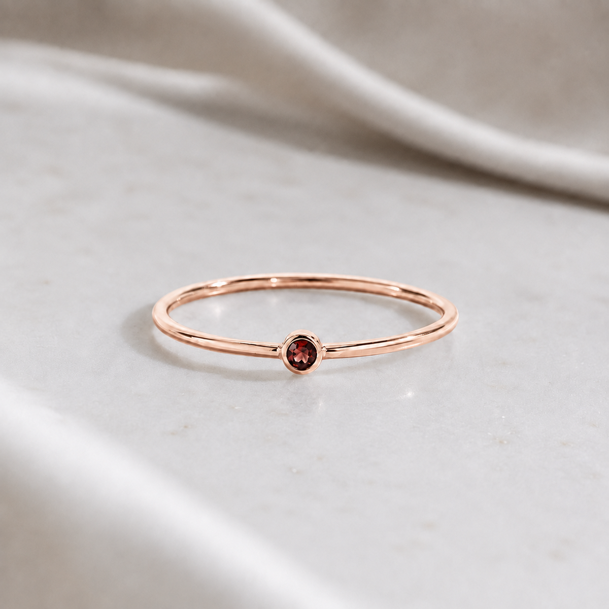     Ashlyn Tiny Garnet Birthstone Ring in 14K rose gold filled with garnet