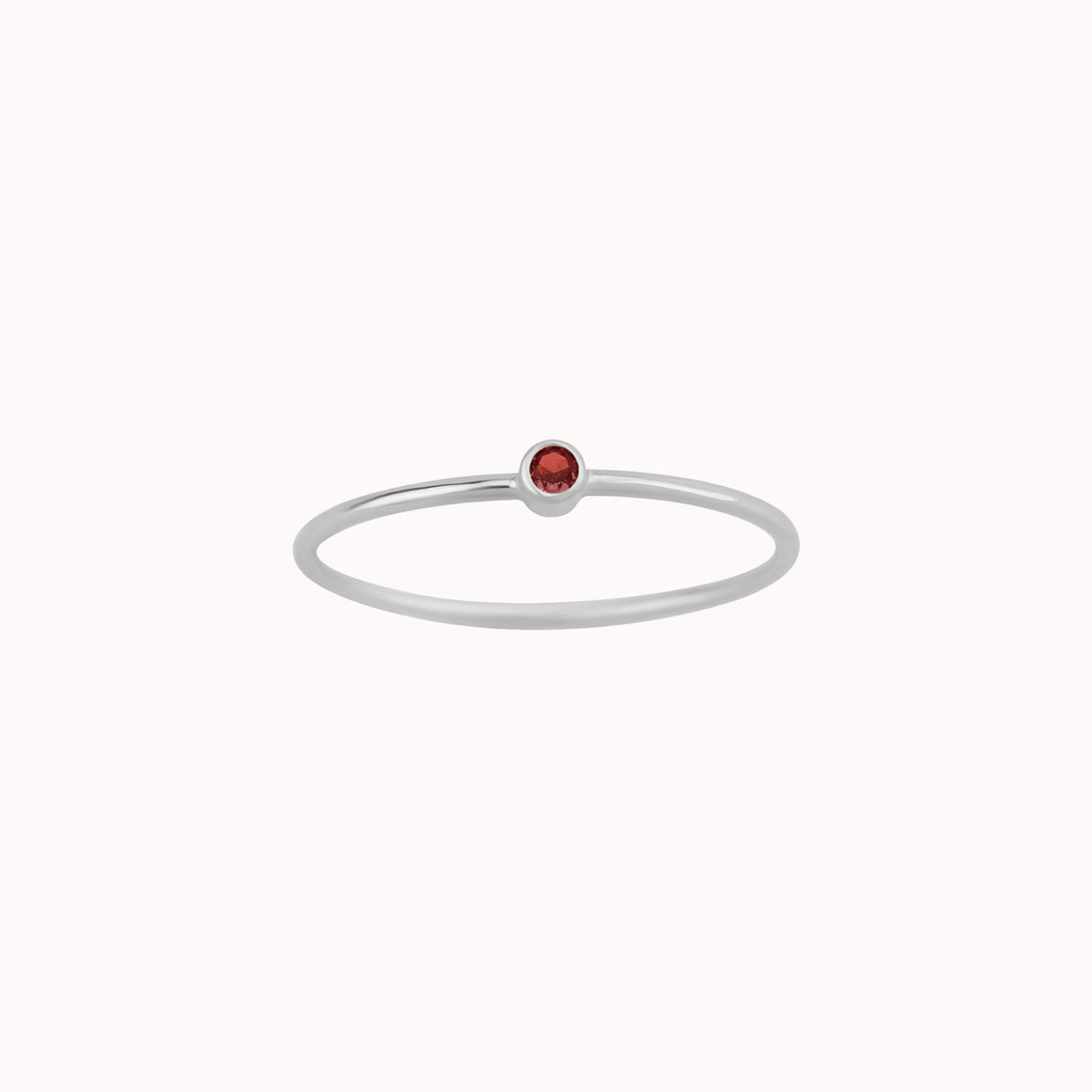     Ashlyn Tiny Garnet Birthstone Ring in sterling silver with red garnet