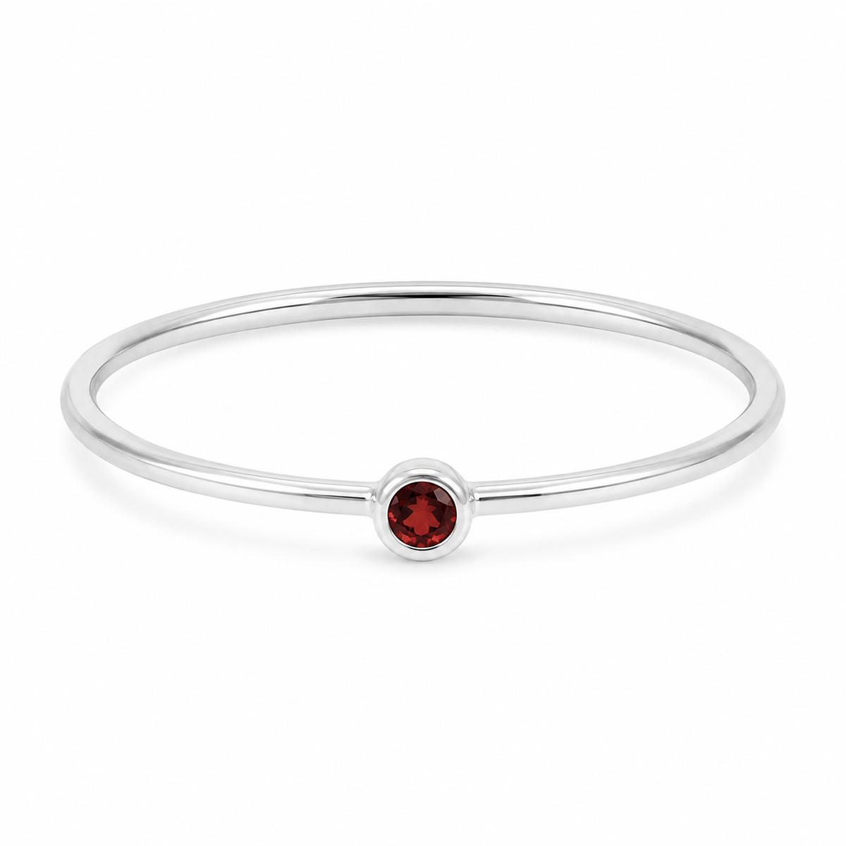     Close-up of Ashlyn Tiny Garnet Birthstone Ring in sterling silver on white background
