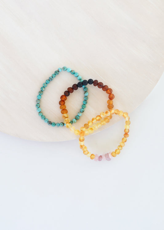 Atlas three-bracelet gift set with turquoise, ombré lava-stone and amber with rose quartz from The Riann Ashlyn Collection.