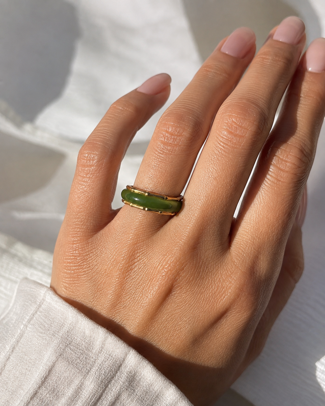 Blaise Jade Ring with green Canadian nephrite jade and gold-plated vintage setting worn on hand