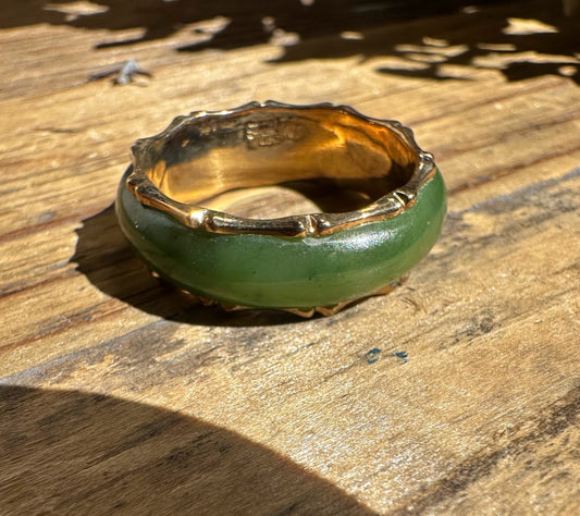 Blaise Jade Ring with green Canadian nephrite jade and gold-plated vintage setting photographed on wood
