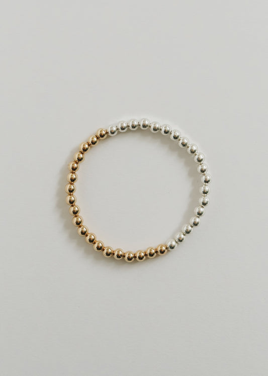 Brighton two-tone beaded bracelet made with 5 mm sterling silver and 14K gold-filled beads, from The Riann Ashlyn Collection.