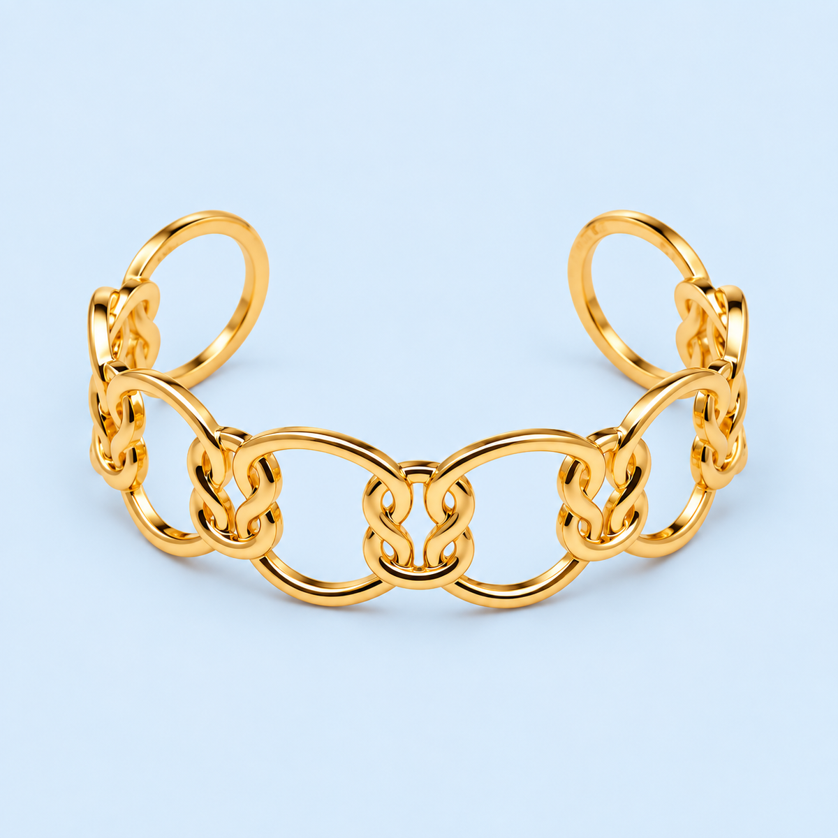 Carys gold link cuff bracelet on Riann Ashlyn blue background