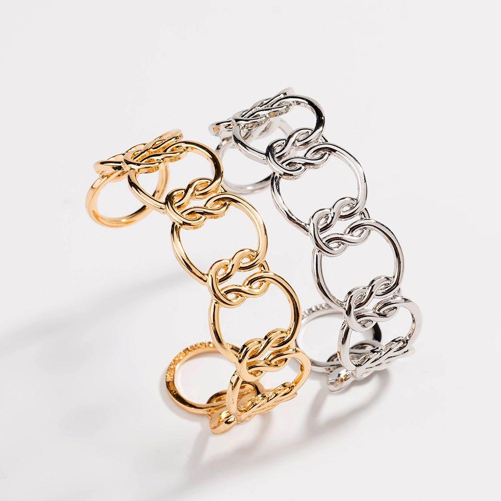 Carys link cuff bracelet shown in gold and silver