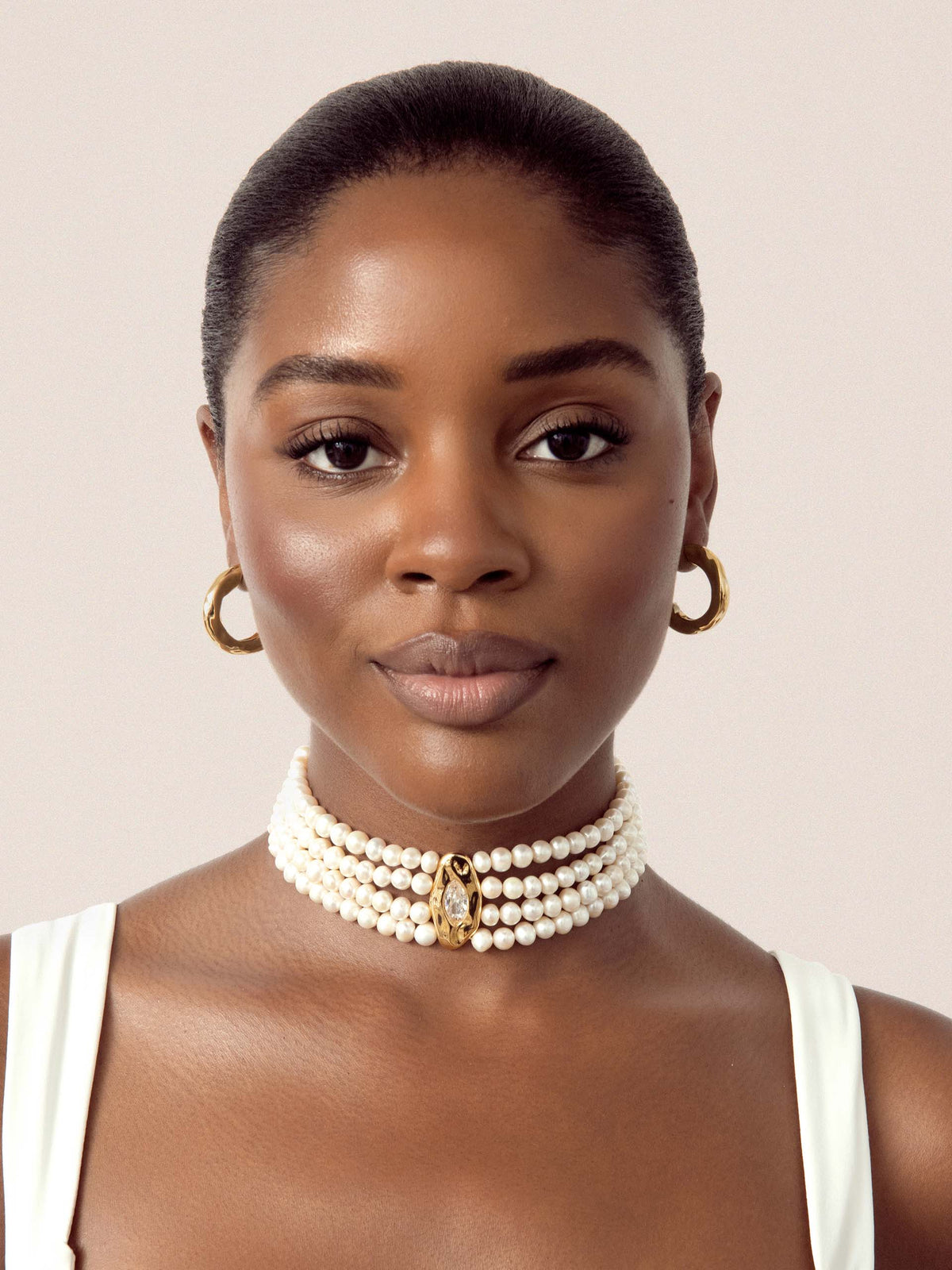   Front view of model wearing Chandler multi-strand freshwater pearl choker