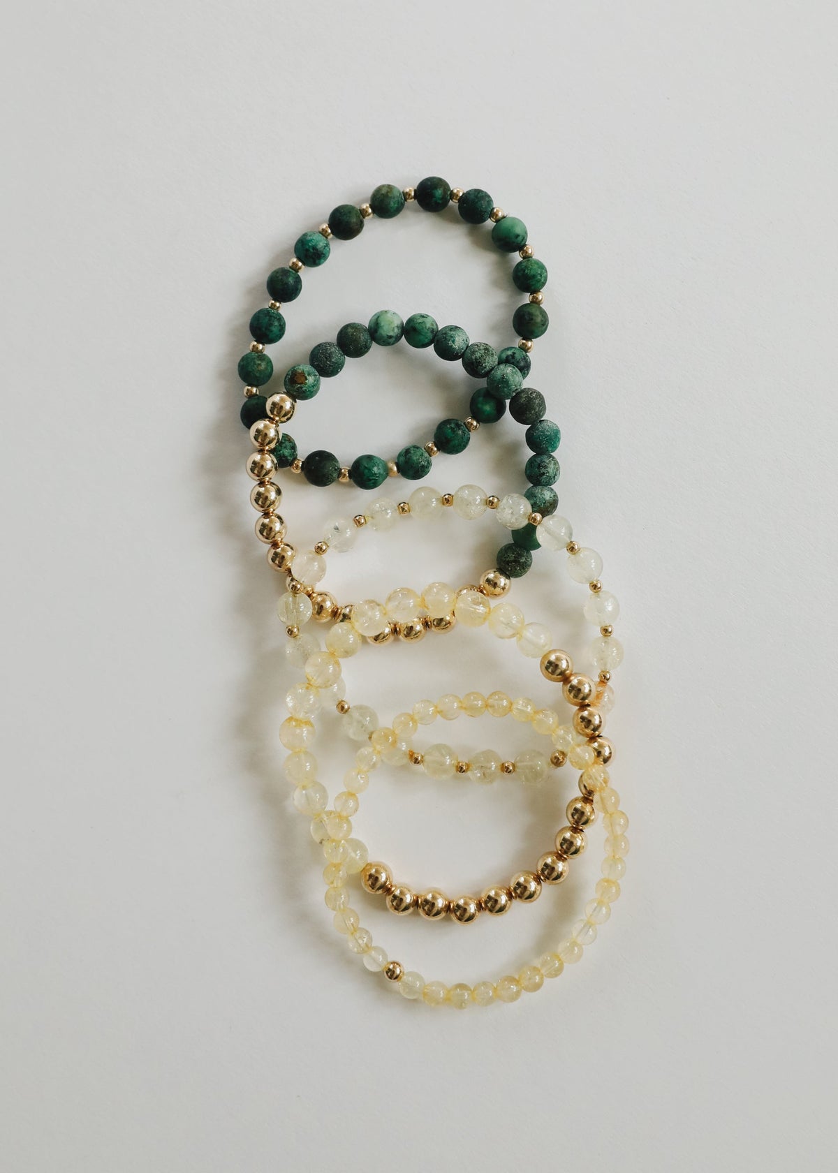 Fia delicate citrine gemstone stretch bracelet, featuring a simple beaded design and one gold-filled accent, from The Riann Ashlyn Collection.