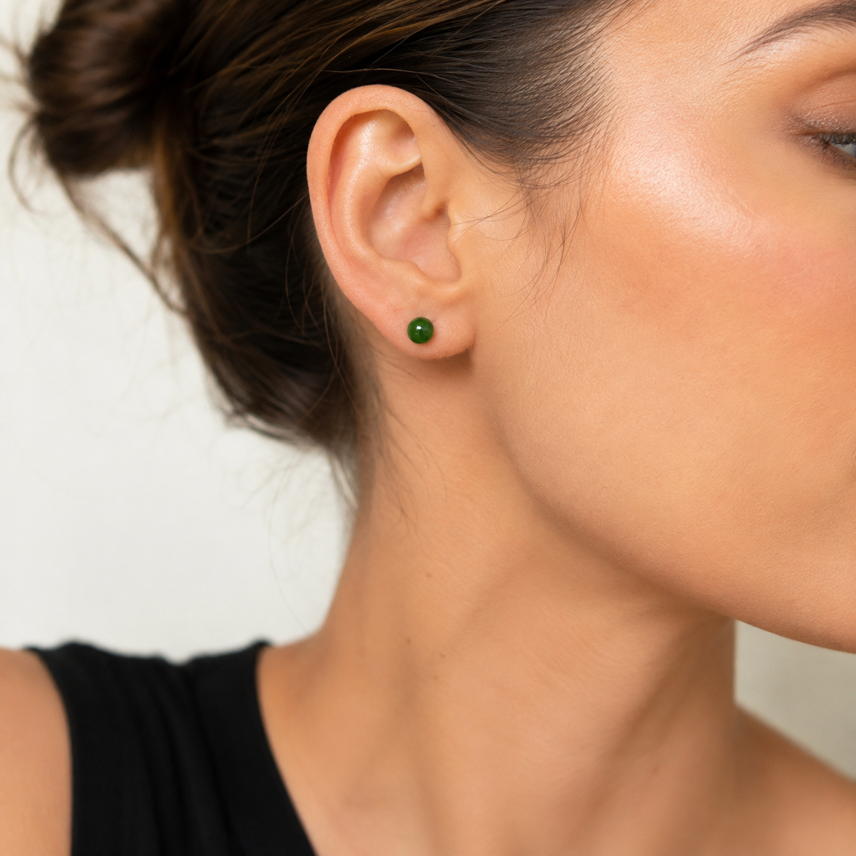     Model wearing Giada Canadian jade stud earrings