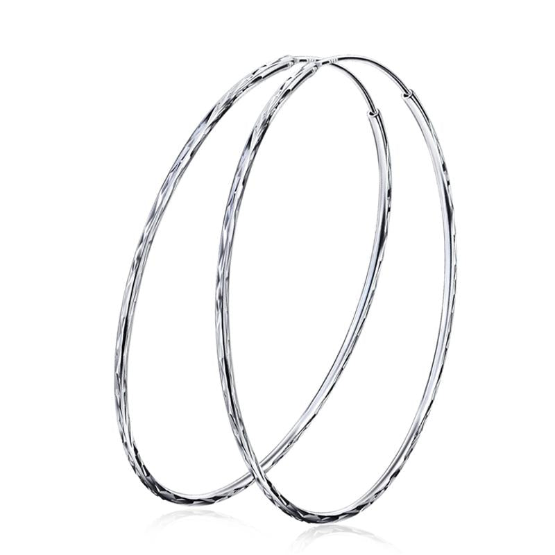 Gwen Endless Hoop Earrings in silver color