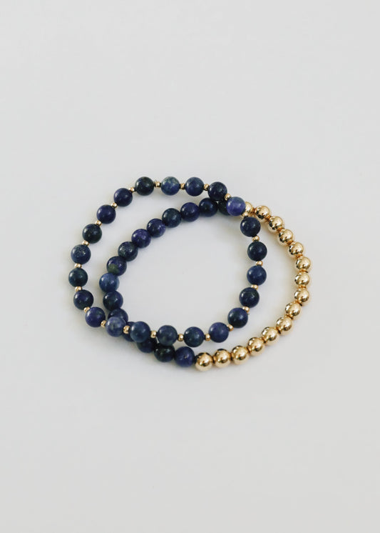 Indi Sun + Moon matching bracelet pair from The Riann Ashlyn Collection, featuring genuine blue lapis lazuli and 14K gold-filled beads.