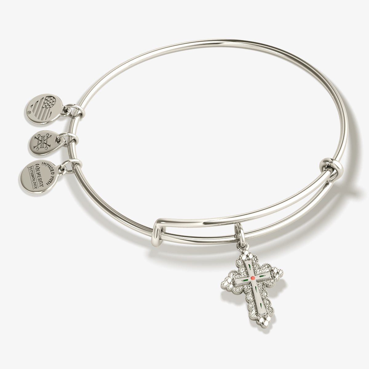     Paisley silver bangle bracelet with an ornate floral cross charm and decorative side charms.
