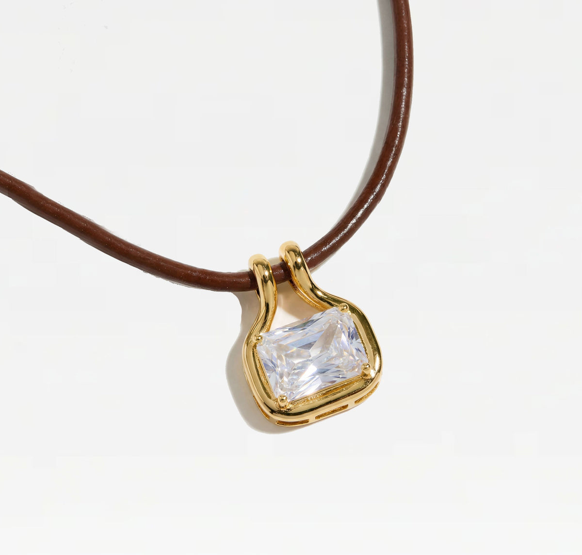 Palmer cubic zirconia pendant necklace with brown leather cord and gold-plated brass