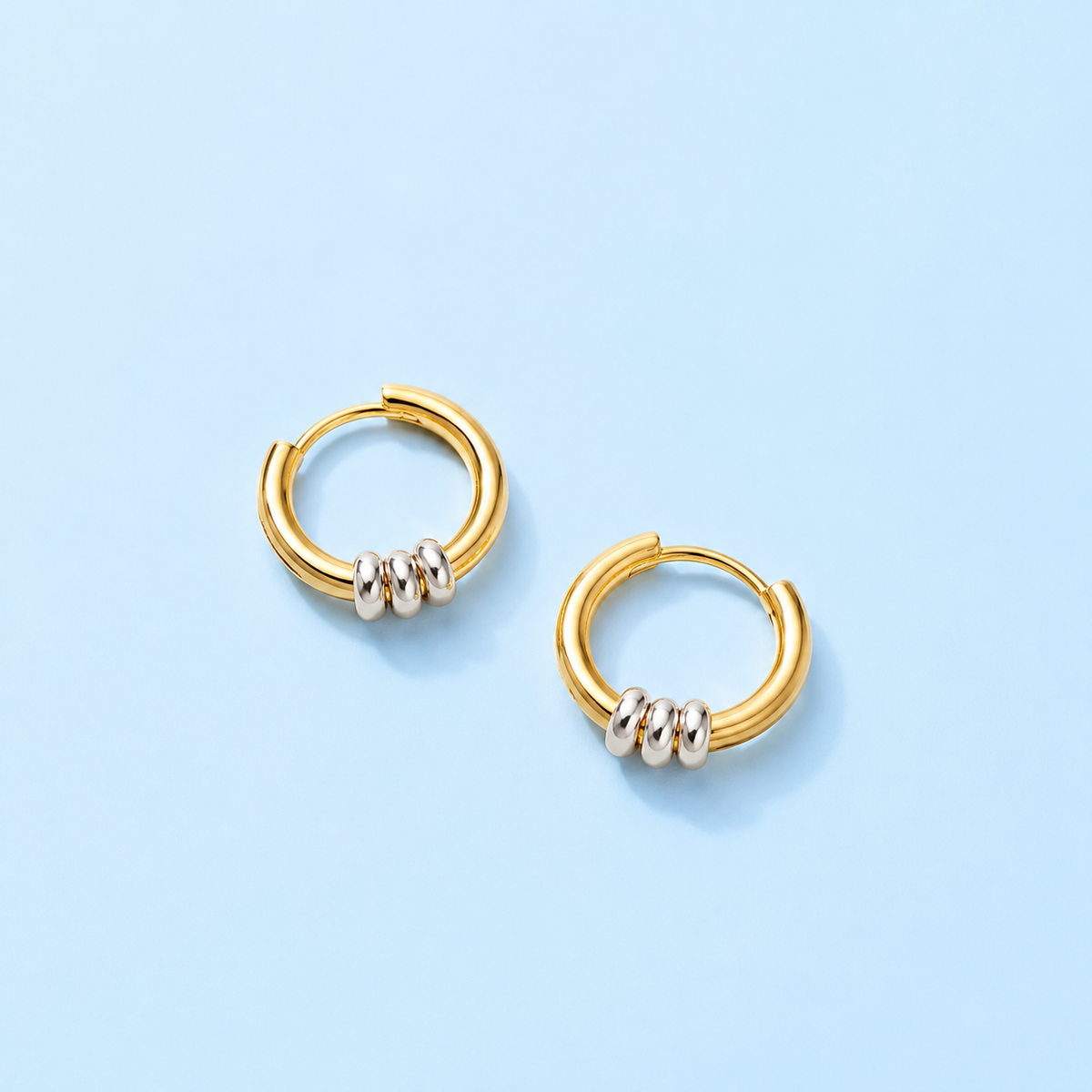 Remi Two-Tone Huggie Hoop Earrings — product image 3, The Riann Ashlyn Collection