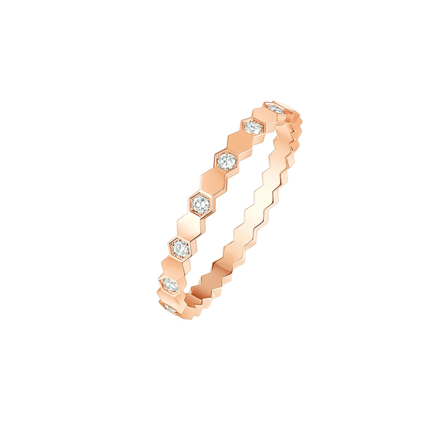 Angled view of Romy rose gold hexagon pavé ring showing alternating clear stones