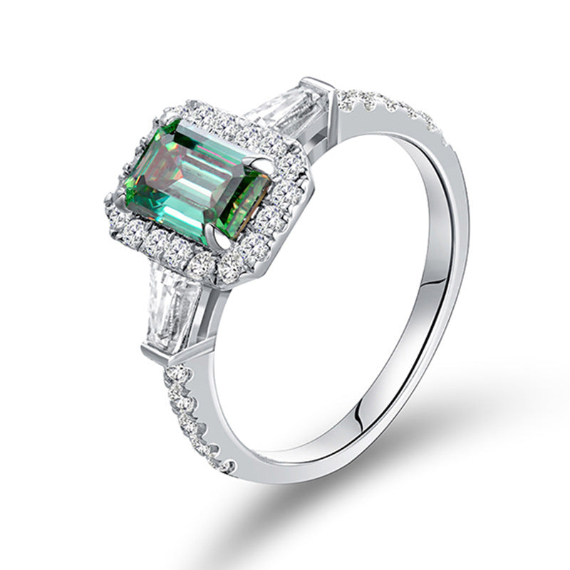 Senna emerald-cut green moissanite ring in sterling silver with 18K gold plating shown at an angle