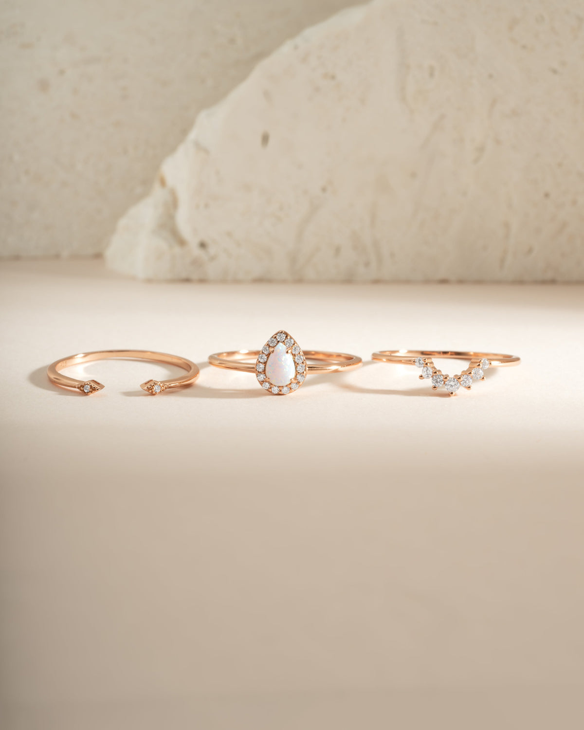 Sutton rose gold three-ring set with pear opal centerpiece