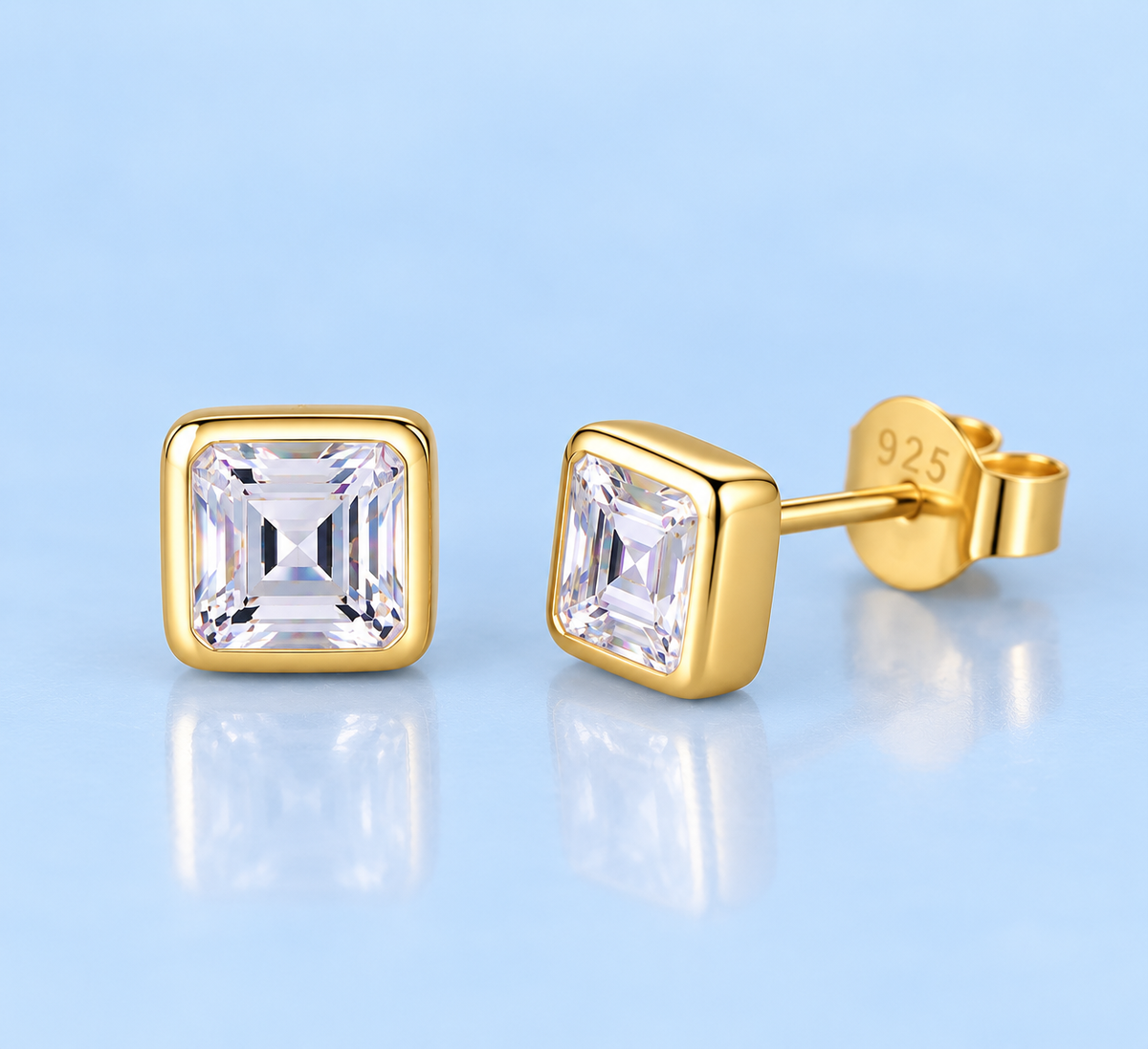     : Close-up of Taryn square cubic zirconia stud earrings in Gold showing the stud post and backing