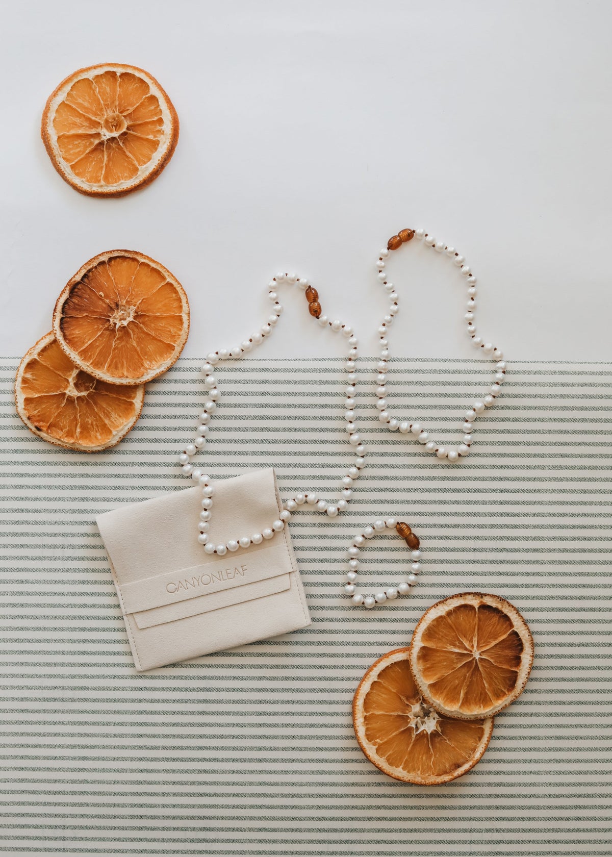 Tinsley matching pearl jewelry featuring a necklace and bracelet from The Riann Ashlyn Collection.