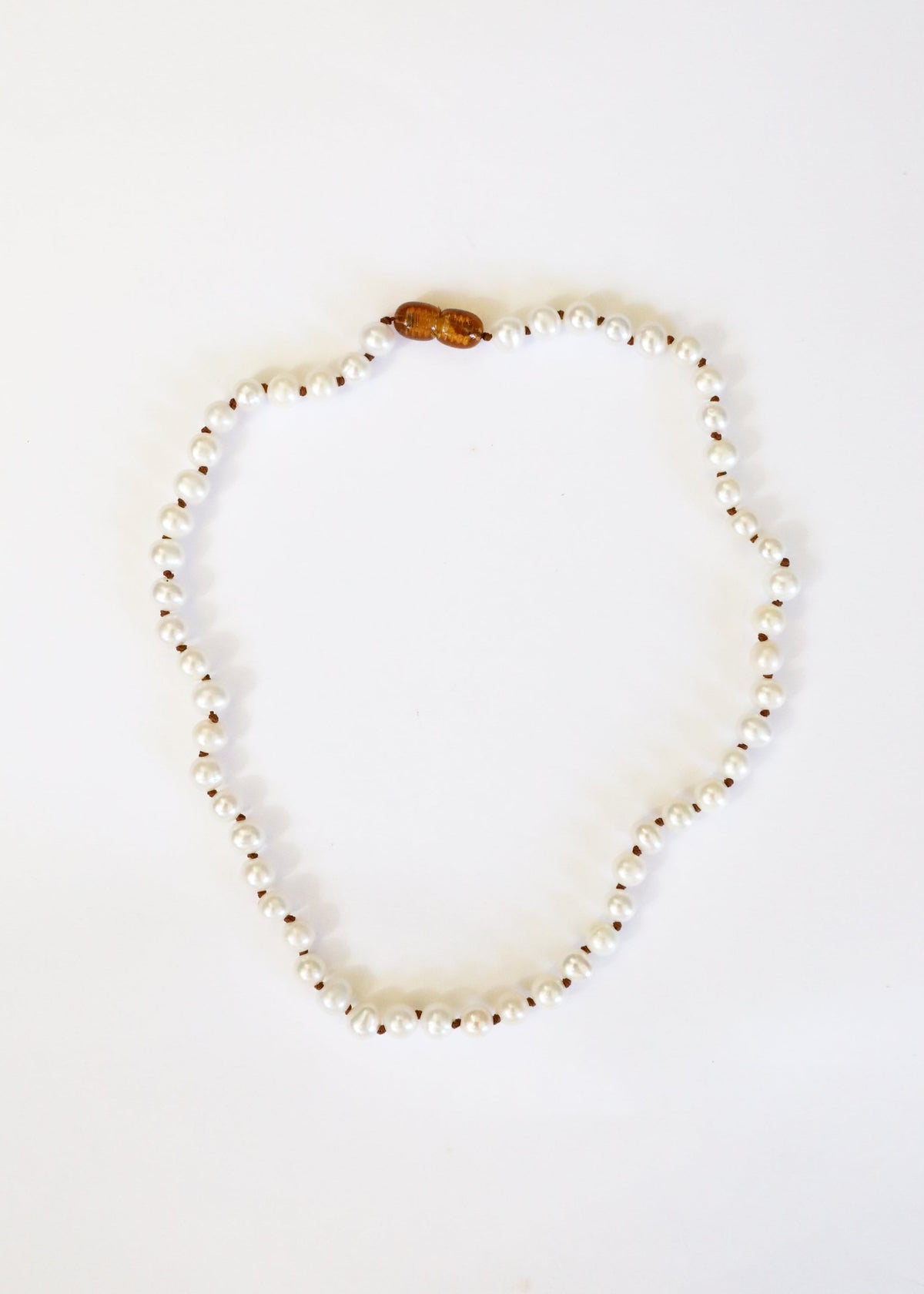 Tinsley coordinating pearl necklace and bracelet jewelry from The Riann Ashlyn Collection.